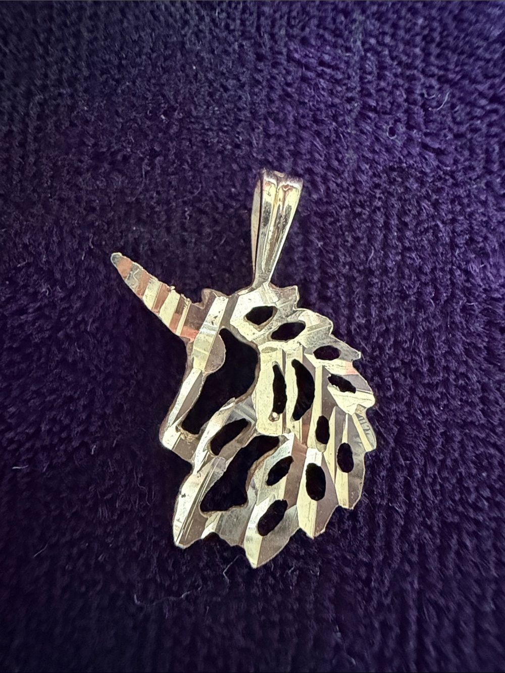 Vintage 10K gold Unicorn pendant with diamond cut surface